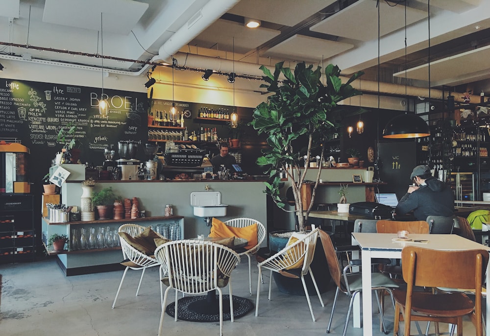 Welcoming cafe with tables for laptop work